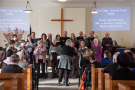 Choir singing at the front of the chapel